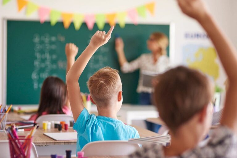 Students raising their hands